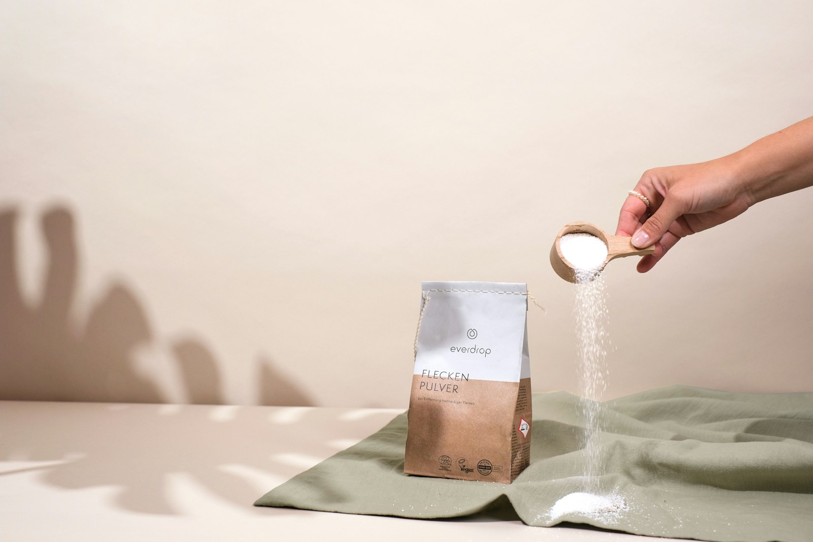 a bag of coffee being poured into a bag
