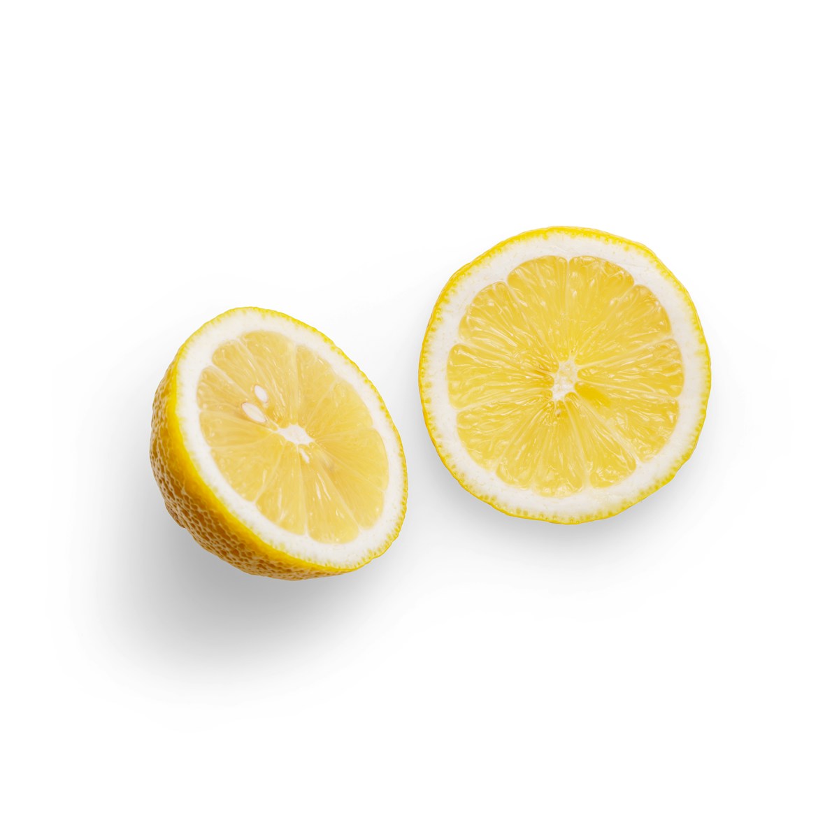 sliced orange fruit on white background